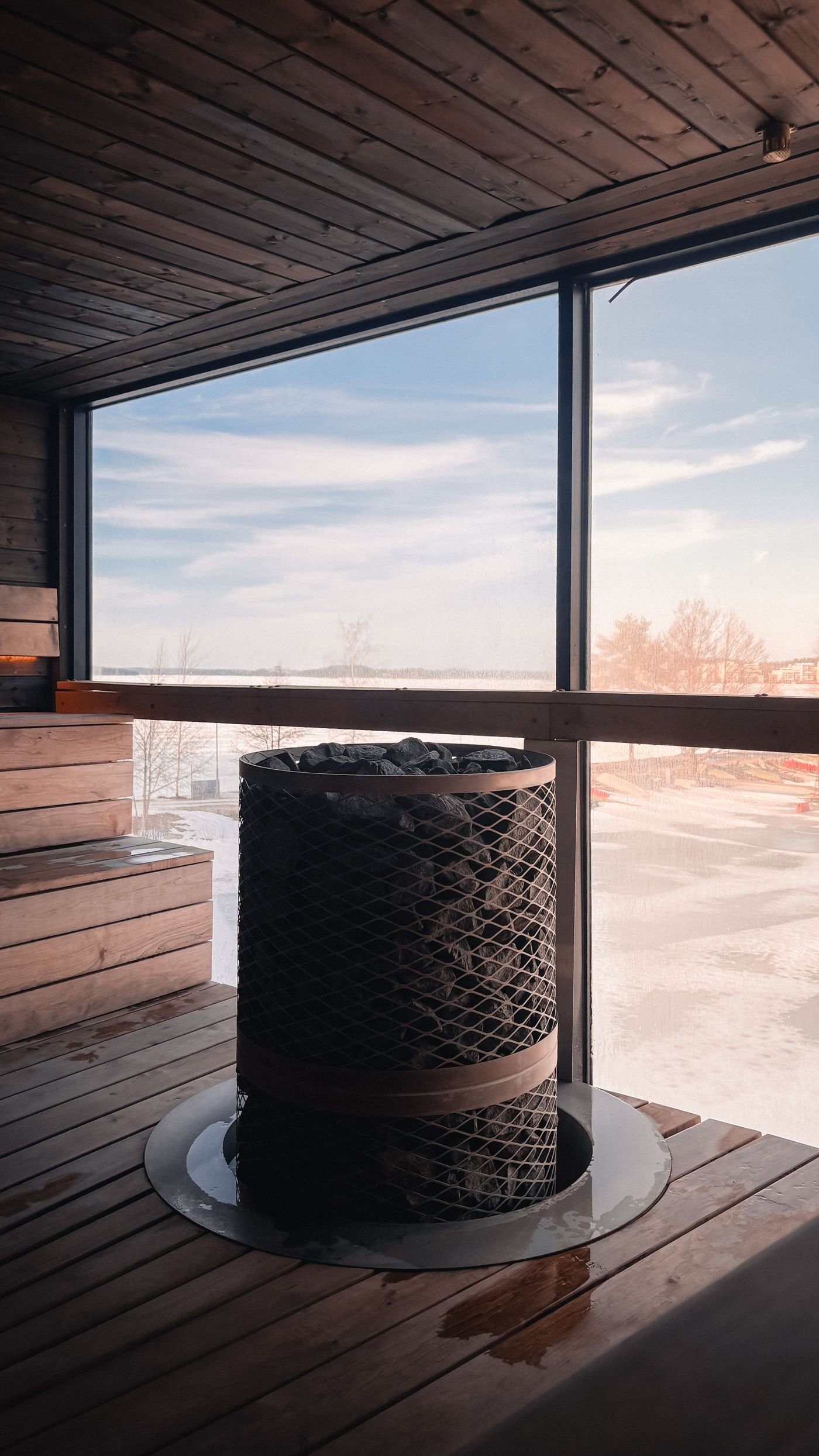 Sauna with a picture window onto nature